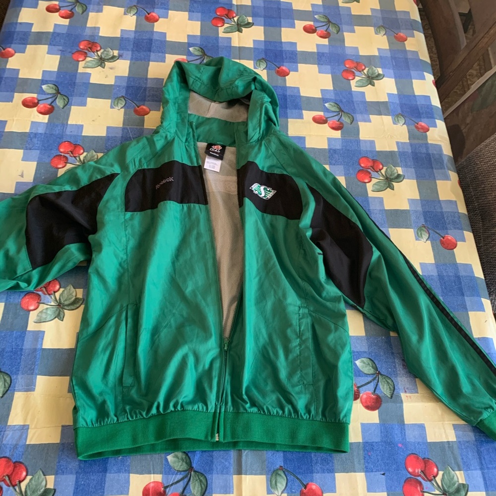 A green Reebok jacket